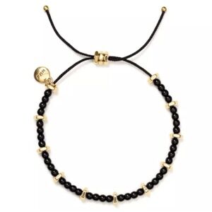 Marc by Marc Jacob’s tiny beaded bracelet with gold and black beads